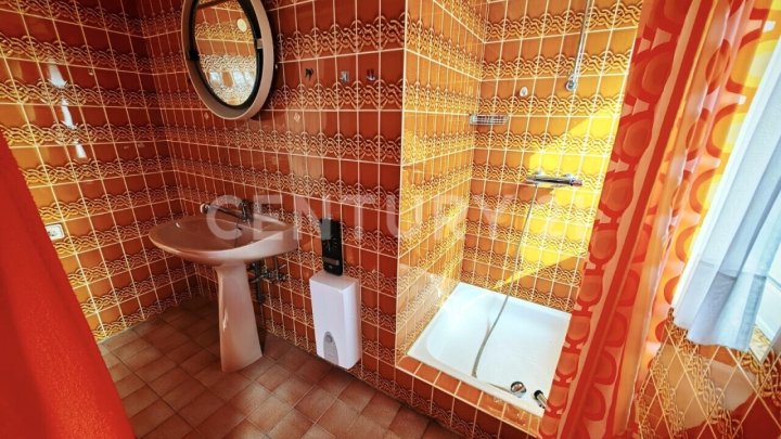 Charmante Dachgeschosswohnung mit Balkon und Gartenzugang