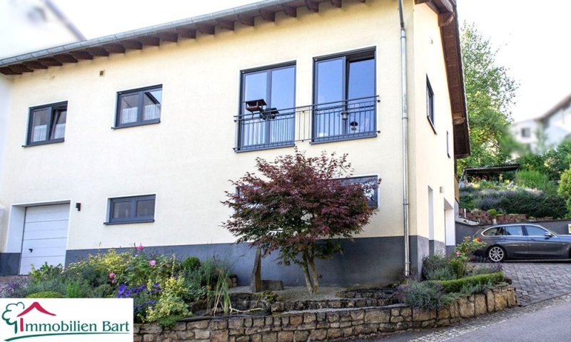 GRENZE L-REMICH: MODERNES WOHNHAUS MIT 80 M² GARAGEN!