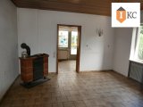 Zimmer mit Kaminofen