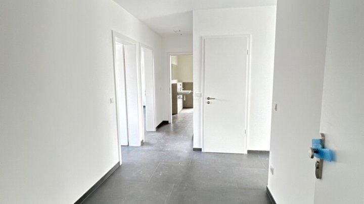Neuwertiges Penthouse mit EBK + 3 Stellplätzen in Energie-Effizienzhaus