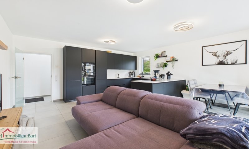 ATTRAKTIVE NEUBAUWOHNUNG MIT GARTEN UND GARAGE IN TOP LAGE!