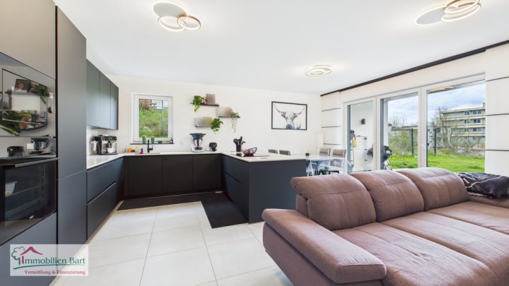 ATTRAKTIVE NEUBAUWOHNUNG MIT GARTEN UND GARAGE IN TOP LAGE!