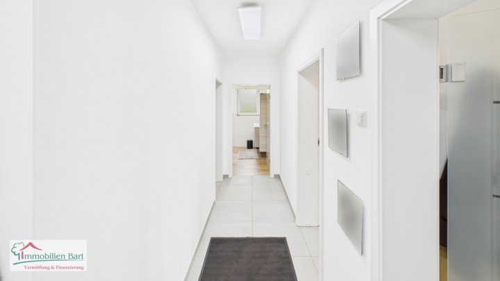 ATTRAKTIVE NEUBAUWOHNUNG MIT GARTEN UND GARAGE IN TOP LAGE!