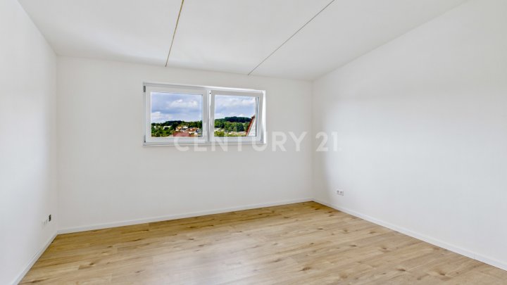 Modernes Wohnen trifft Dachgeschoss-Charme – exklusives Neubau-Highlight