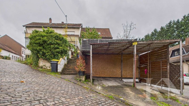 Gemütliches Einfamilienhaus mit Garten und Carport in zentraler Lage von Spiesen-Elversberg!