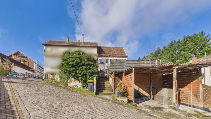 Einfamilienhaus mit Garten und Carport in zentraler Lage von Spiesen-Elversberg!