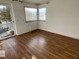 Schlafzimmer mit Zugang zum Balkon