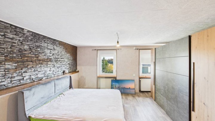 Einfamilienhaus in Merchweiler – modernisiert 2024, 102 m² Wohnfläche und großer Garten!