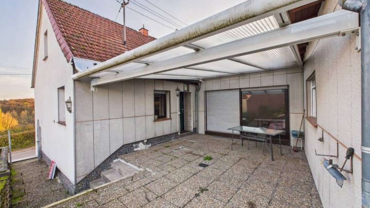 Einfamilienhaus in Merchweiler – modernisiert 2024, 102 m² Wohnfläche und großer Garten!