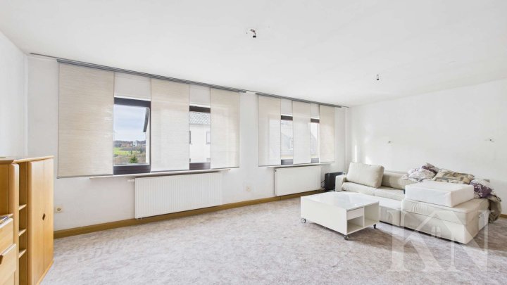 Vielseitiges Zweifamilienhaus mit großem Potenzial in zentraler Lage von Püttlingen!