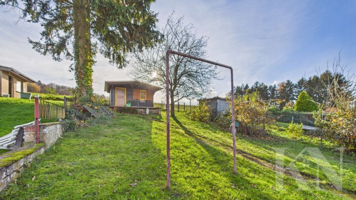 Zentral gelegenes Zuhause mit Potenzial – Doppelhaushälfte in Köllerbach