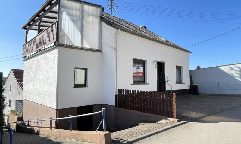 Familienfreundliches Einfamilienhaus mit Garten und Stellplatz