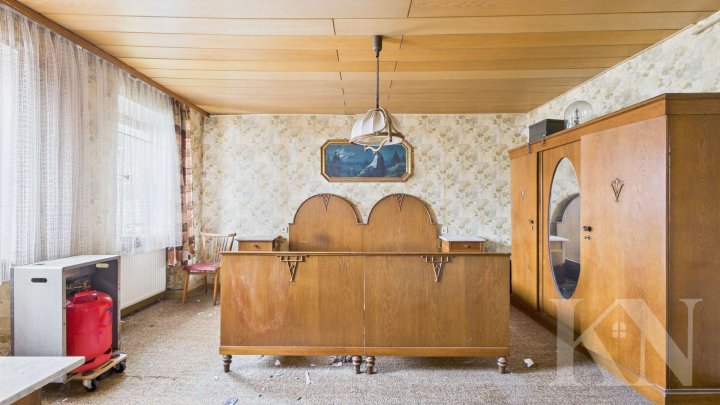 Einfamilienhaus mit Scheune und Ausbaupotenzial in Marpingen-Urexweiler!