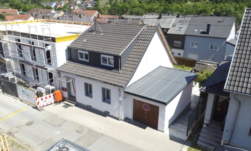 Einfamilienhaus mit Einliegerwohnung und zusätzlichem Grundstück
