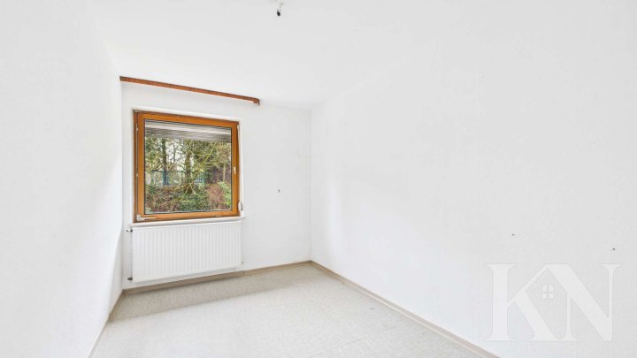 Charmantes Einfamilienhaus mit großem Balkon und Garten