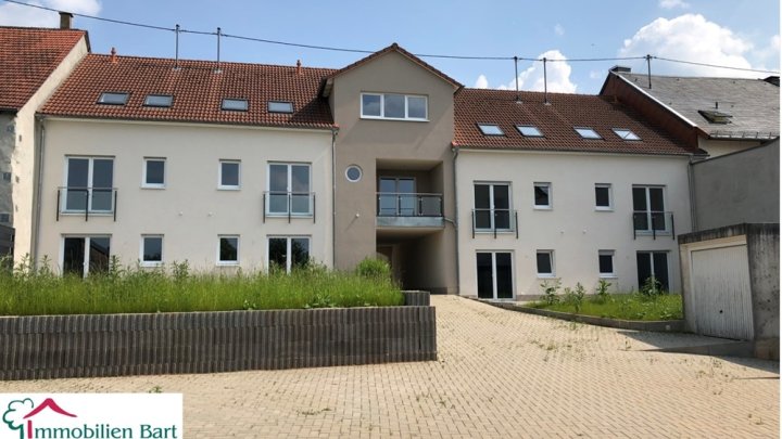 NEUBAU IN SONNIGER LAGE MIT TERRASSE, GARTEN UND GARAGE!