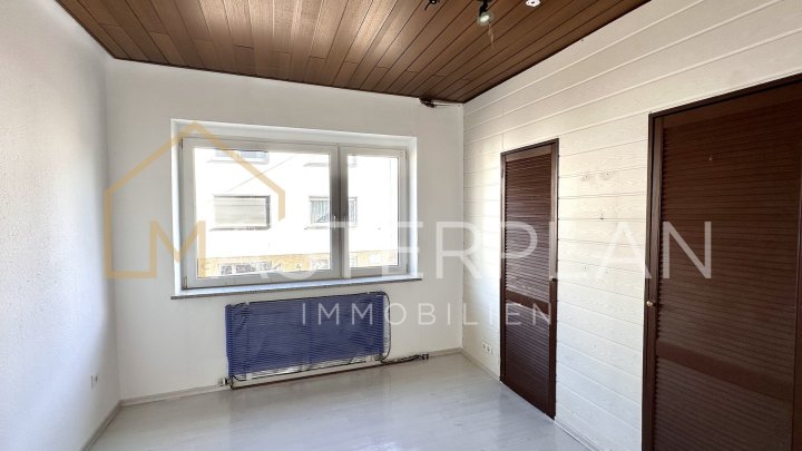 2ZKB Erdgeschoss mit Balkon, Garten und Garage