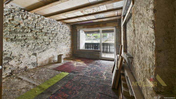 Reihenmittelhaus mit viel Potenzial und großen Garten sucht neuen Besitzer