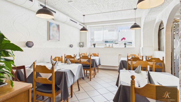 Renditeobjekt in Völklingen-Geislautern: Wohn- und Geschäftshaus mit Restaurant und 3 Wohneinheiten