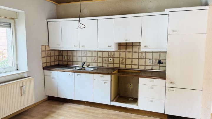 Renovierungsbedürftiges Reihenendhaus mit Potential in zentraler Lage von Dillingen-Diefflen