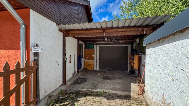 WOHNEN IN IXHEIM - Freistehendes Einfamilienhaus mit Garage und Terrasse in 66482 Zweibrücken
