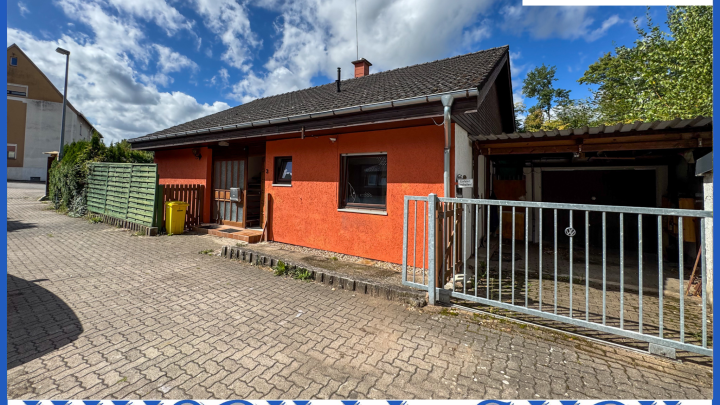 WOHNEN IN IXHEIM - Freistehendes Einfamilienhaus mit Garage und Terrasse in 66482 Zweibrücken