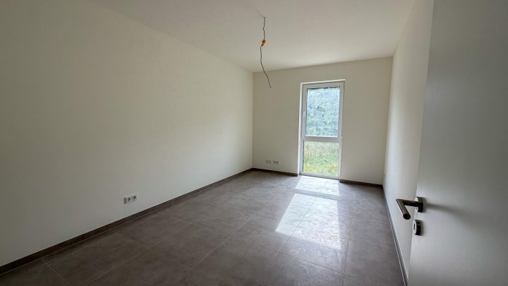 Neubau-Doppelhaushälfte in Zweibrücken: Wohnen am Jacobyberg im modernen Stil mit Garten