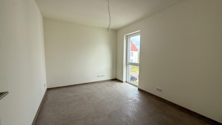 Neubau-Doppelhaushälfte in Zweibrücken: Wohnen am Jacobyberg im modernen Stil mit Garten