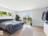 Elternschlafzimmer mit Zugang zur Terrasse